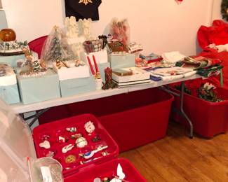 Christmas items including ornaments, linen, decorative pieces, wrapping paper, lights, garland, and trees.