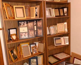 Wide assortment of frames and bookcases.