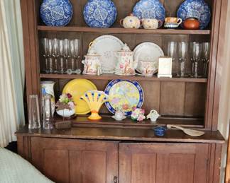 Primitive stepback cupboard