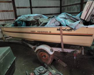 Boat motor and trailer