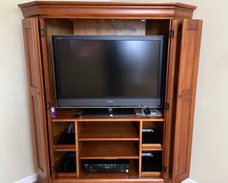 Oak corner TV cabinet and Sony TV