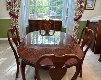 Cherry dinning room table and chairs