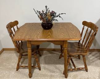 Vtg. oak drop leaf table and 2 chairs
