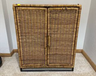 Vtg. bohemian wicker and rattan 2 door cabinet