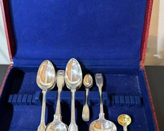 Silver serving spoons