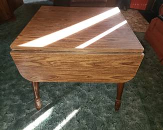 Drop leaf laminate top table