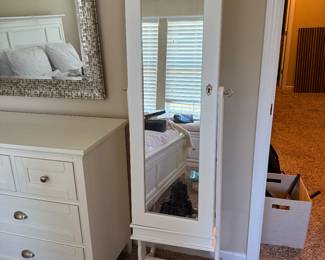 Standing mirror with jewelry storage
