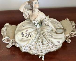 Vintage elegant lady on sofa