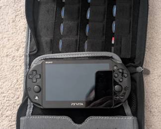 WST071 Mobile PlayStation "Vita" Handheld Set with (14) Games.