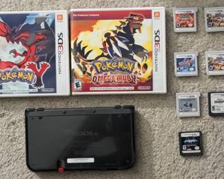 WST047 Mobile "Nintendo 3DS" with Games. Play them anywhere you go! (2) Unused "POKEMON" Games.