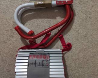 WST050 Escape Ladder by "Kidde" and an Unused Gigantic Cooking Spatula for Making Breakfast.