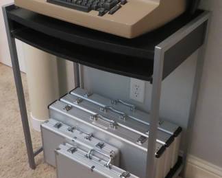 IBM Selectric II vintage electric typewriter.   The ultimate office typewriter back in the day.  Cute little computer stand, poker chip cases