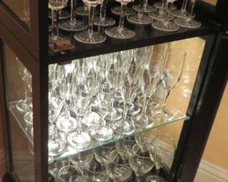 Top shelf - Waterford Ashling crystal.  Bottom shelves - Libbey champagne flutes and wine glasses.