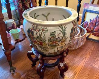 Large fishbowl planter and stand.