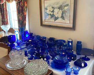Tables full of blue glassware