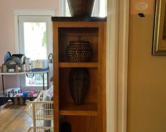 Copper vase; African masks and baskets