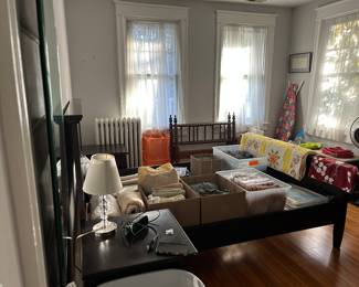 Linens; blankets; accent pillows; storage items