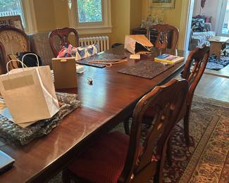 Dining table with two leaves and eight chairs