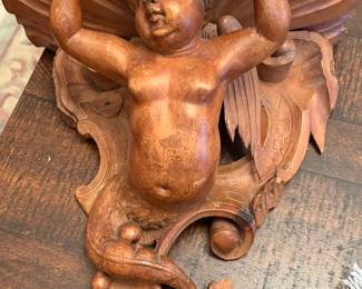 Antique carved cherub