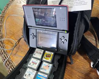 Nintendo DS w/Stylus, bag, charger, & 9 Games. 