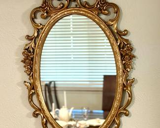 Vintage gold framed oval mirror 