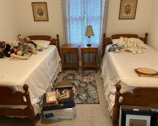 pair of twin beds and nightstands