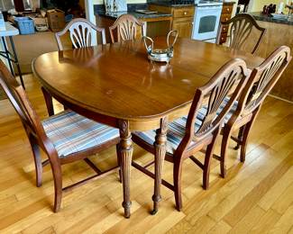 Dining table with 6 chairs including 1 arm chair