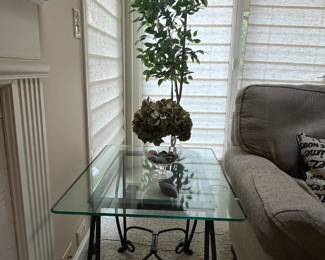 Green wrought iron table with glass topper