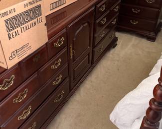 Thomasville Cherry Long Dresser - 3 drawers on both sides with a door that opens in the middle revealing 3 more drawers