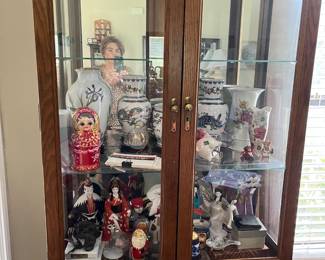 8 foot lighted, mirrored curio cabinet - excellent for displaying your collectibles and merchandise; All items in curio for sale including many collectible vases and antique items