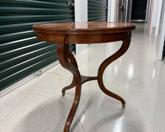27” round occasional table with brass feet