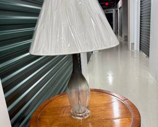 Clear and smoke grey frosted glass table lamp with pleated fabric shade