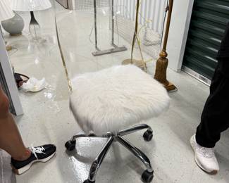 Faux fur and acrylic vanity chair with chrome base and wheels