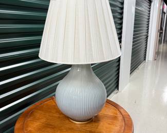 Set of two pale blue ceramic table lamps with white pleated fabric shades