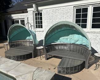 Pair of patio daybeds with retractable footrests