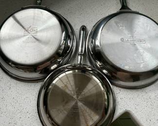 All-clad and Le Creuset pans 