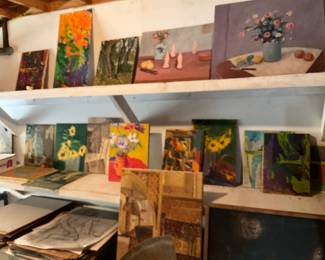 Large number of paintings on board
