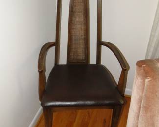 Just one of these Mid Century Modern corner chairs