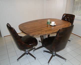 Mid Century Modern table, and yes we did find the other chair, it was shy, but we reunited it