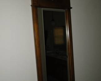 Another wood framed wall mirror. This one has to be hung up and down