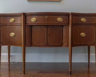 SOLD
Baker hard wood side board in excellent condition