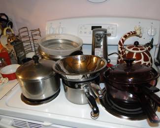 Pots and pans and cranberry colored Pryex