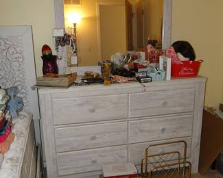 We have a complete bedroom set too. Long dresser with matching mirror