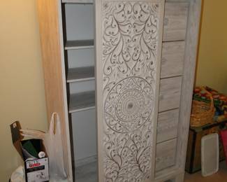 Tall dresser with sliding door and drawers
