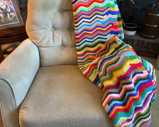 tan recliner, handmade afghan