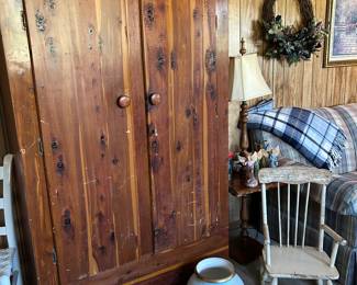 cedar wardrobe, handprinted urn, small white rocker