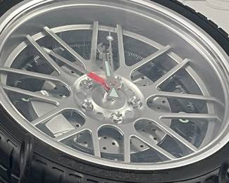 MAN CAVE TIRE CLOCK