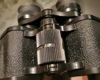 Binoculars.  Yes, you too can spy on your neighbors.