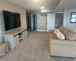 80” TV, Credenza, Sofa Bed