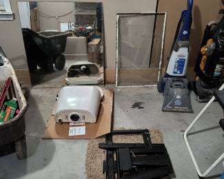 Plastic wheelbarrow, Glacier bay toilet tank, carpet cleaner, vaccum, step stool, large tv mount, mirror
